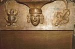 St Mary's church East Lavant, Sussex 15th century medieval misericords misericord misericorde misericordes Miserere Misereres choir stalls Woodcarving woodwork mercy seats pity seats Man in round cap supported by two tailed lizard and leaf.jpg